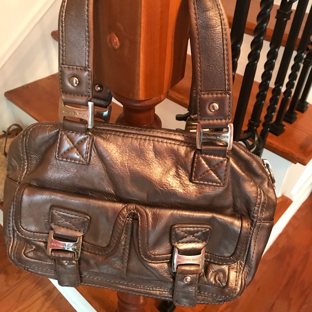 Michael duffle type purse with matching wallet.